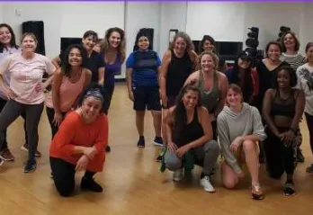 A group from a dance classes pose for a photo at the Community Y at Gulf Breeze.