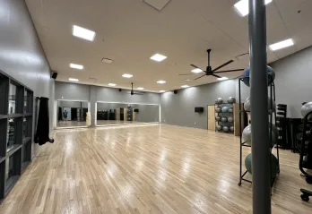 The photo shows changes in the renovated studio space in the Community Y at Gulf Breeze, including new lighting, paint, and refinished flooring..