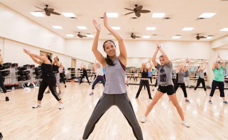 members taking cardio dance class