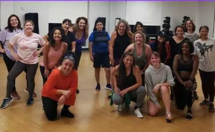 A group from a dance classes pose for a photo at the Community Y at Gulf Breeze.