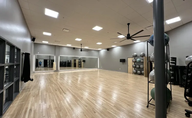 The photo shows changes in the renovated studio space in the Community Y at Gulf Breeze, including new lighting, paint, and refinished flooring..