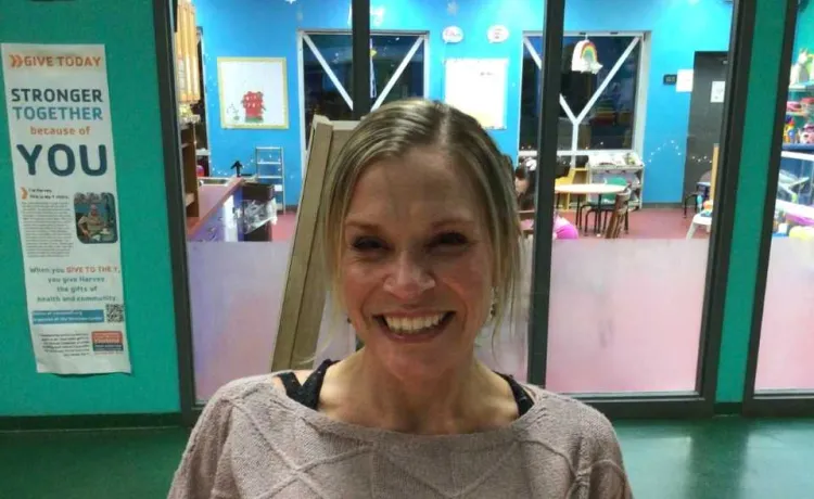 Betty J. Pullum Family YMCA member Stephanie smiles for a photo at the welcome center.