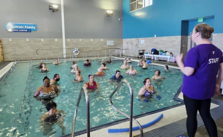 Members in the activity pool at BLS are pictured working through a water aerobics class led by Lorrie.