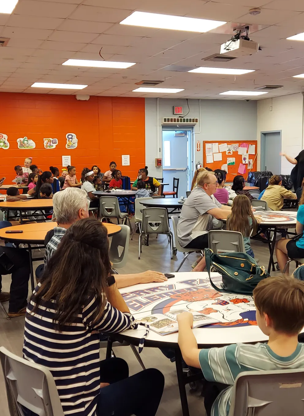 families gather at Ferry Pass Elementary